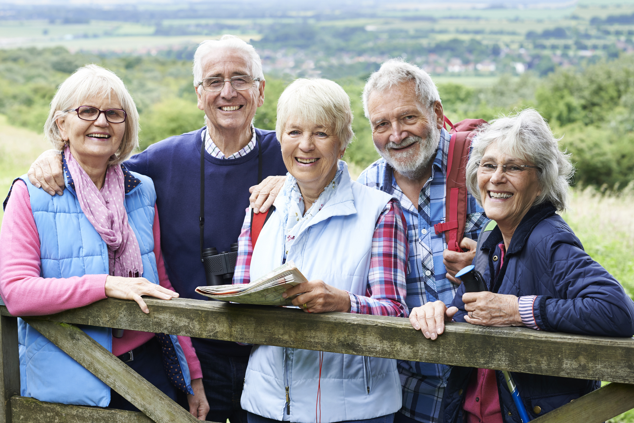Group Of Senior Friends Hiking In Countryside Award-Winning Assisted Living for Couples in Florence
